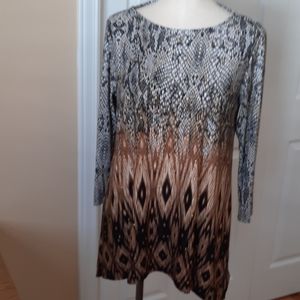 Embellished sharkbite tunic